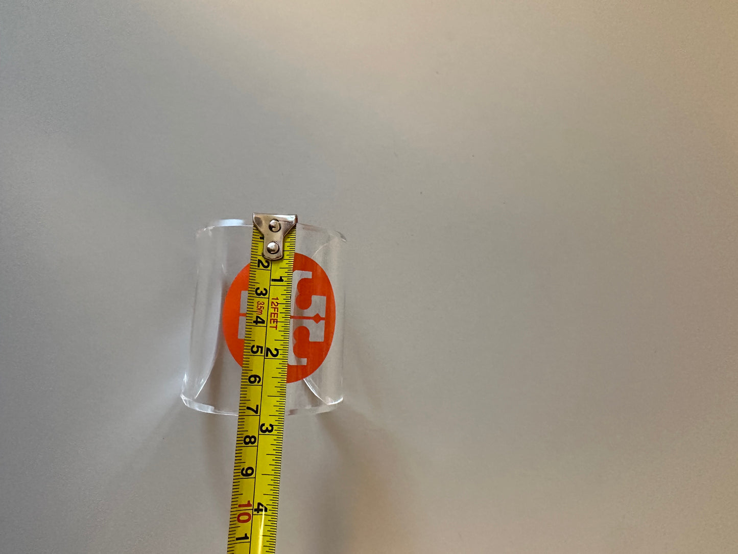 Tory Burch Clear Lucite Orange Logo Cuff Bracelet