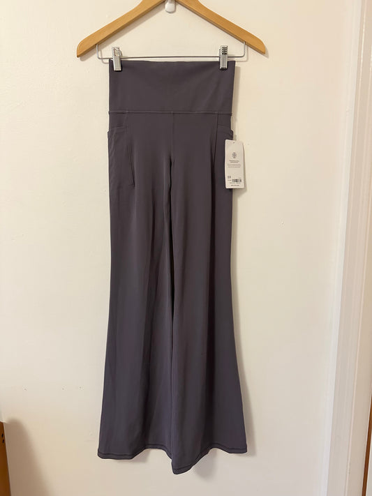 NWT Athleta Salutation Stash High Rise Flare Pant in Dusk Violet | Size XS