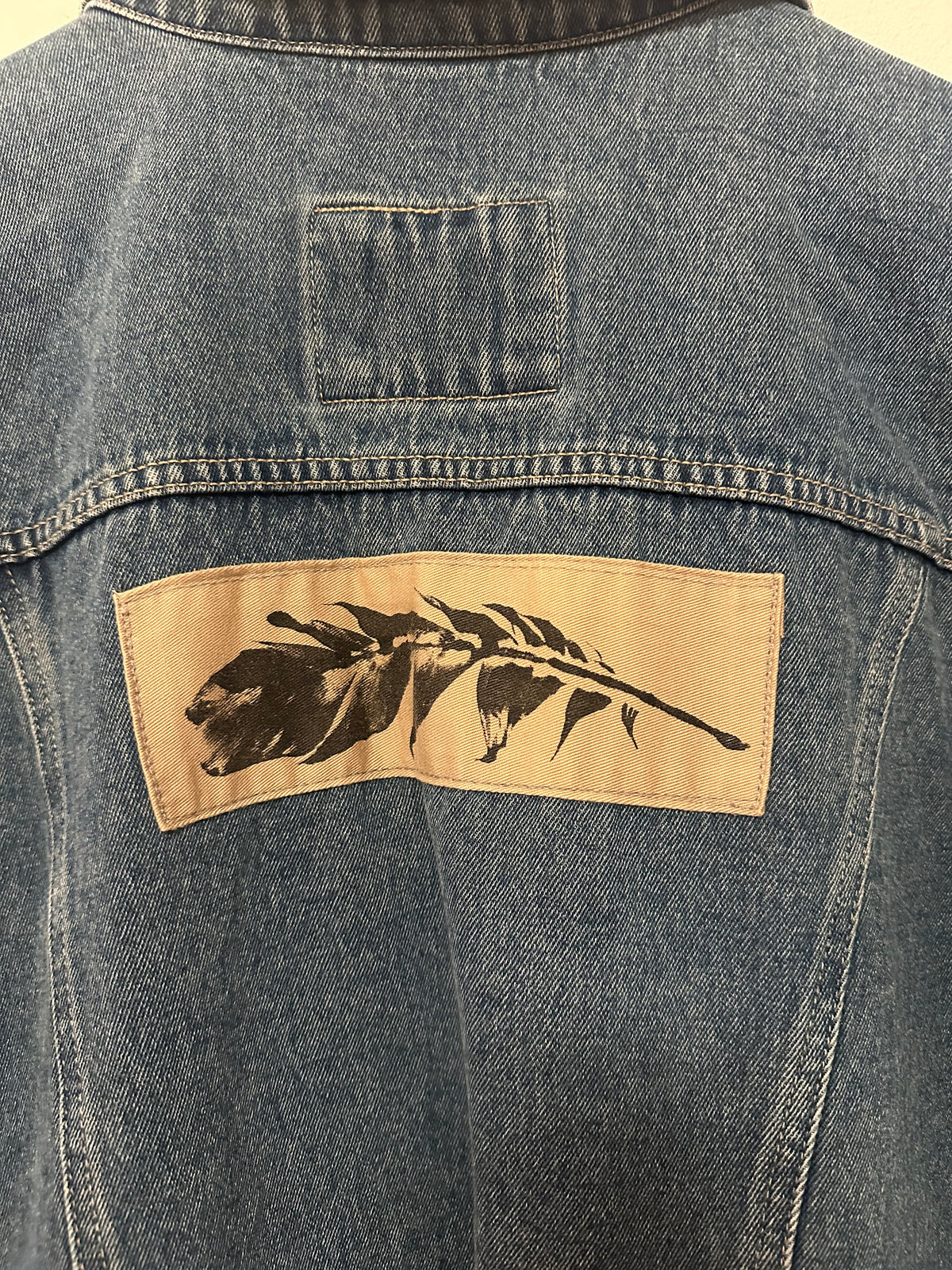 Crossing Pointe Blue Denim Trucker Jacket with Feather Back Patch in Cotton | Size XS