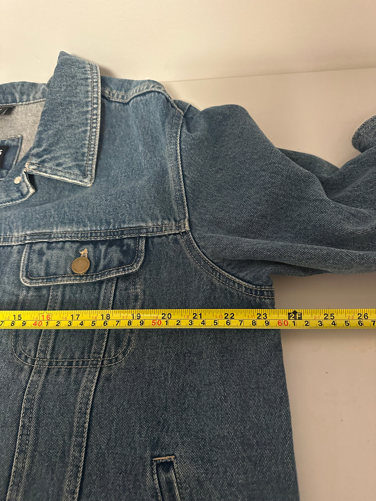 Crossing Pointe Blue Denim Trucker Jacket with Feather Back Patch in Cotton | Size XS