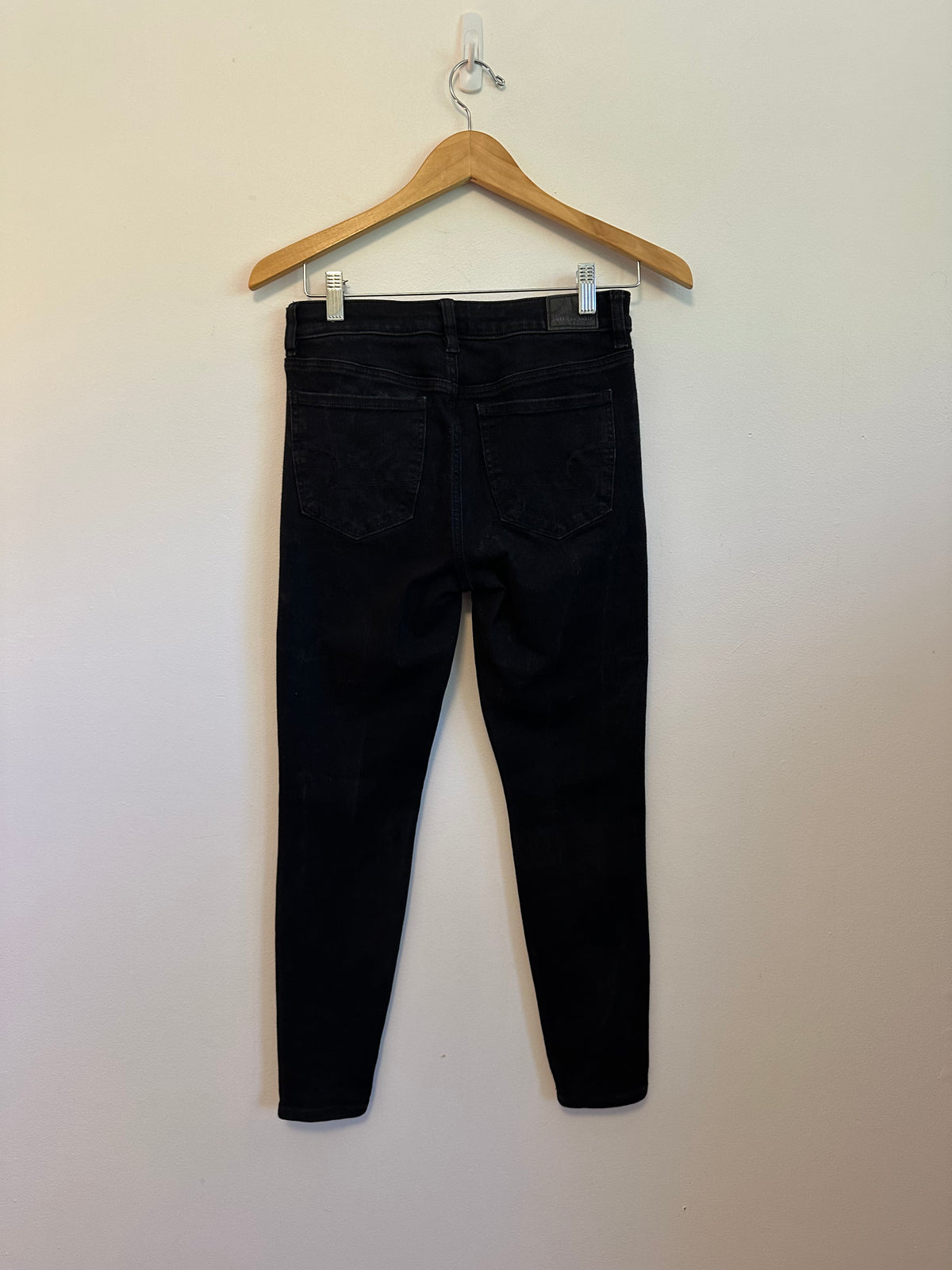 American Eagle Next Level Stretch Skinny Jeans in Black | Size 4 Short