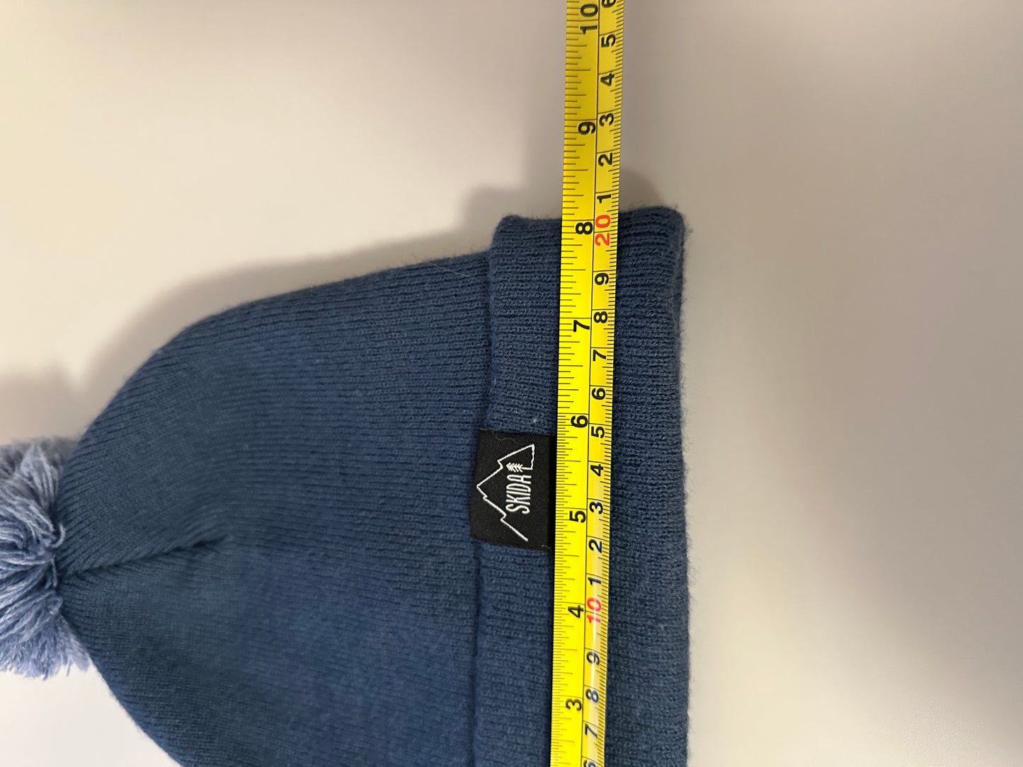 Skida Firetower Pom Beanie Hat in Blue