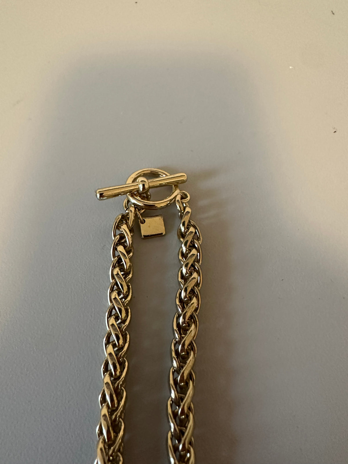 Gold Tone Wheat Chain Tassel Necklace with Pavé Crystal Accents and Toggle Clasp