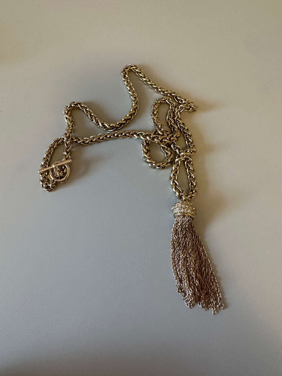 Gold Tone Wheat Chain Tassel Necklace with Pavé Crystal Accents and Toggle Clasp