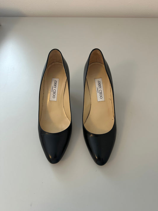 Jimmy Choo Black Leather Rounded Toe High Heel Pumps | Size 38.5