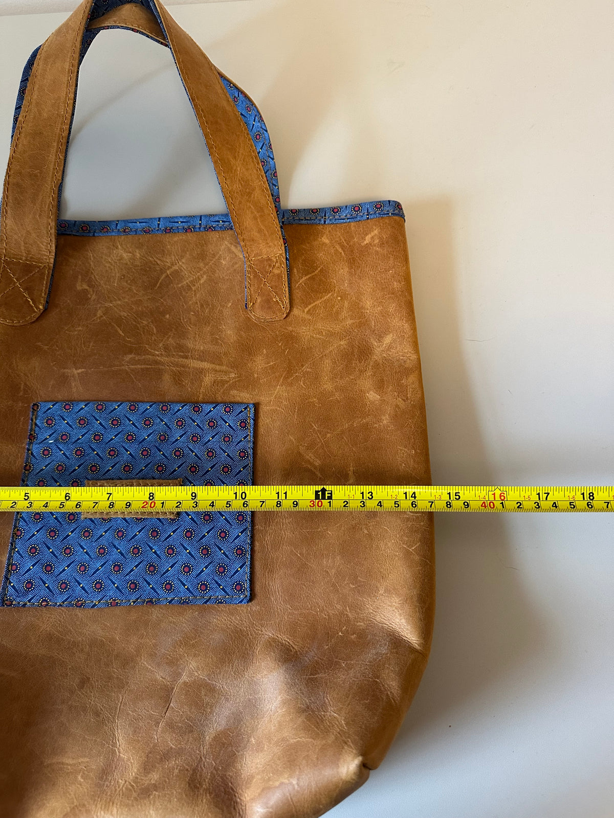 Besisi Distressed Brown Leather Tote Bag with Blue Geometric Trim