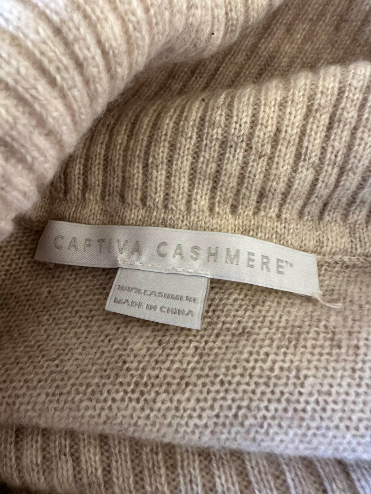 Captiva Cashmere Turtleneck Asymmetrical Poncho in Oatmeal Beige