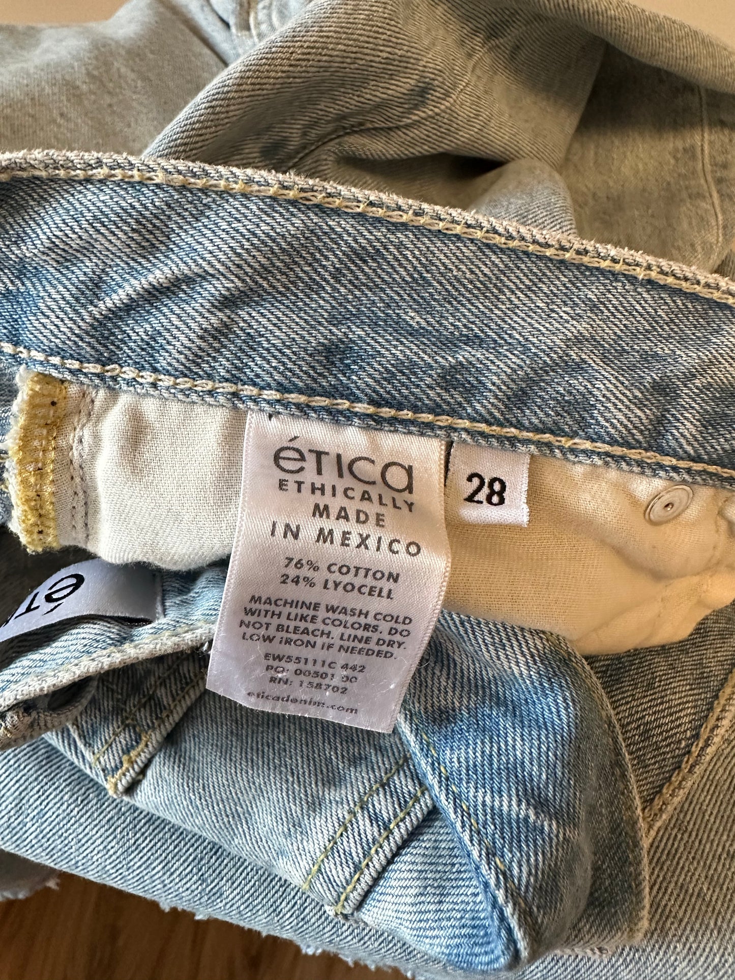 Etica Light Wash High Rise Wide Leg Raw Hem Jeans | Size 28