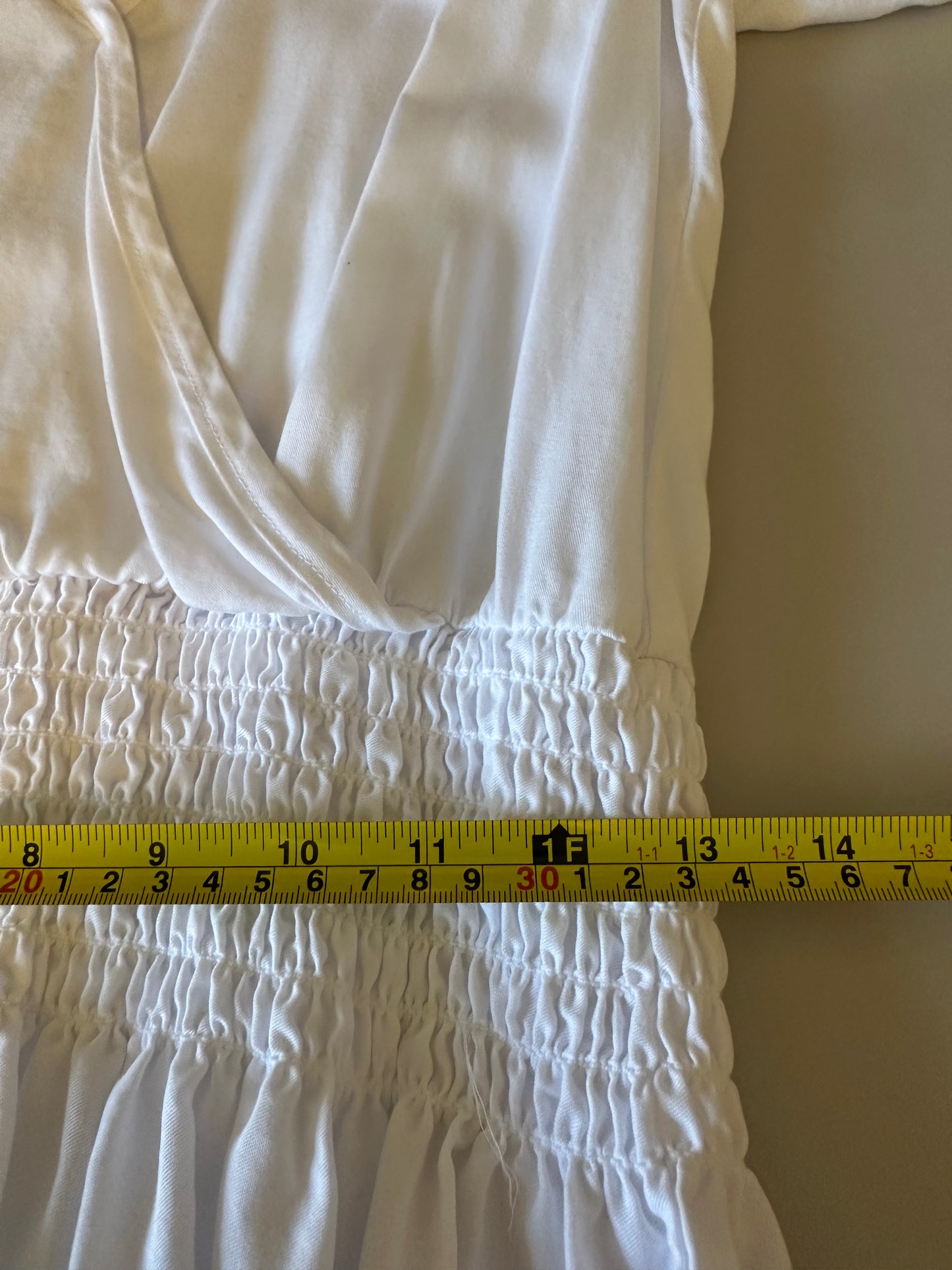 Red Haute NWT Sleeveless Smocked Wrap Blouse in White | Size Medium