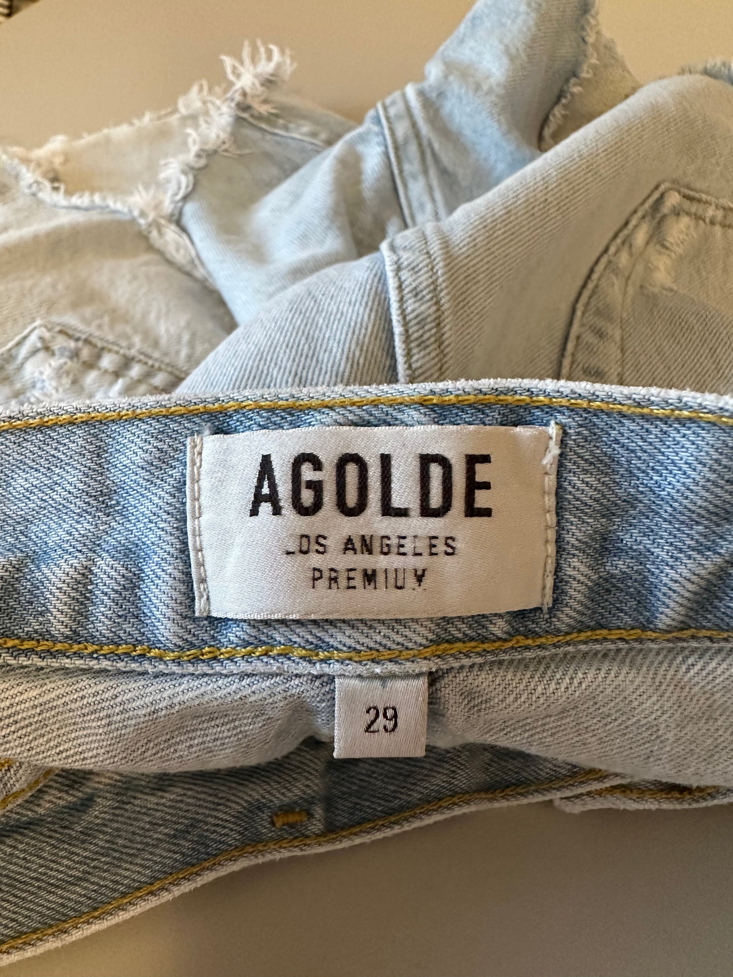 AGOLDE Dee High Rise Distressed Jean Shorts in Light Blue | Size 29
