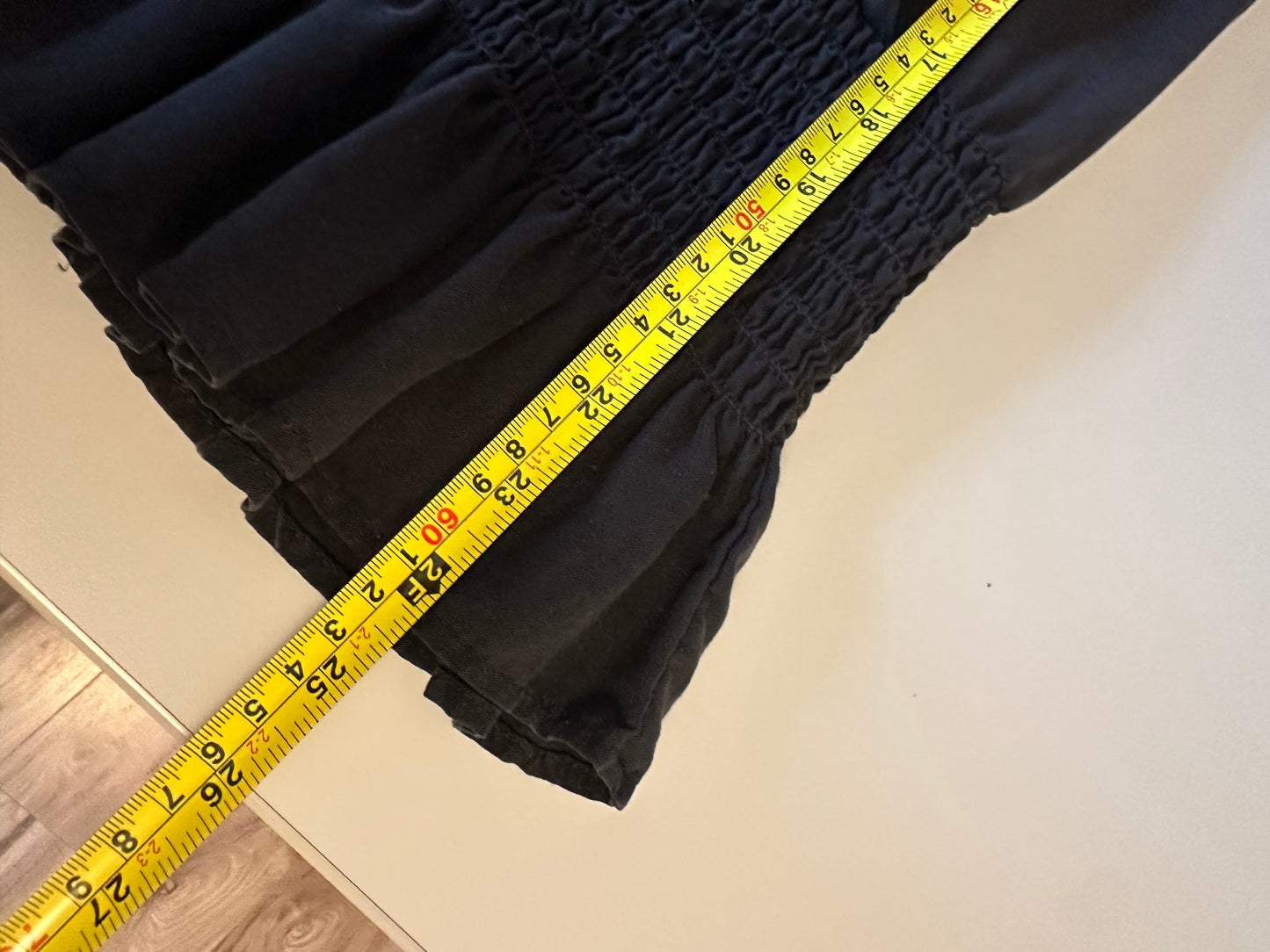 Red Haute NWT Sleeveless Smocked Wrap Blouse in Black | Size Small