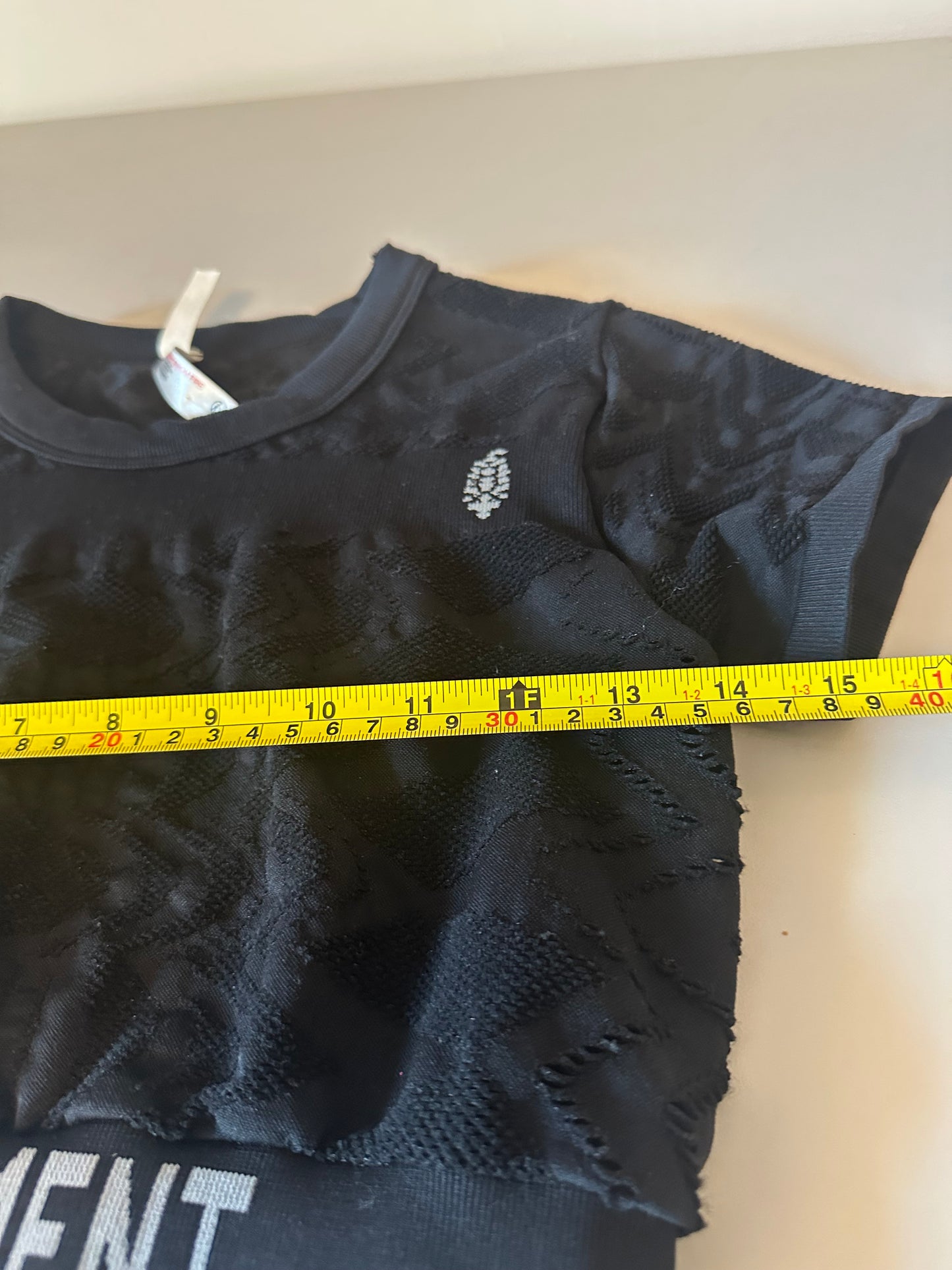 NWT FP Movement by Free People Run The Distance Baby Tee in Black | Size M/L