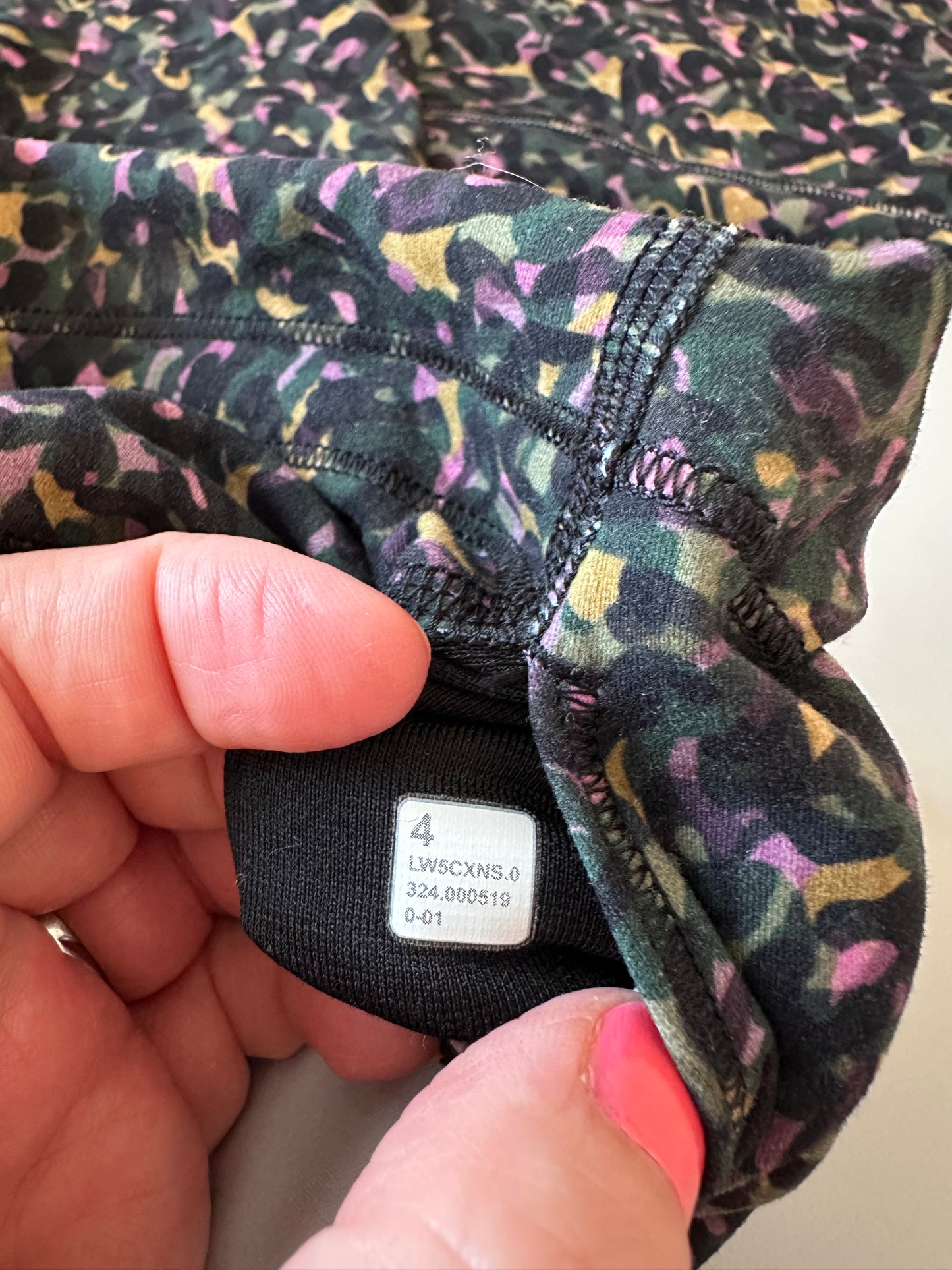 Lululemon Wunder Train High-Rise Tights in a Fluctuate Micro Pink Multi | Size 4