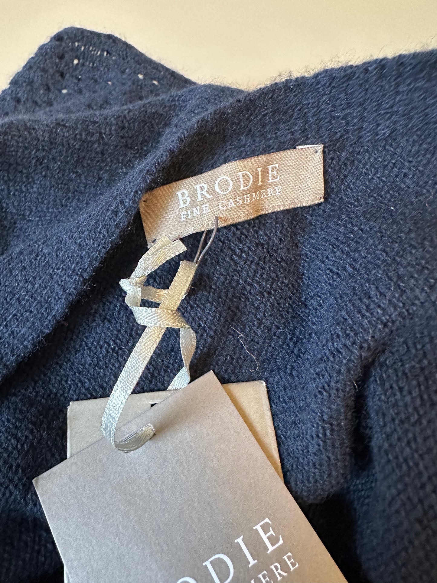 NWT Brodie Cashmere Asymmetrical Navy Blue Poncho with Pink Tassels