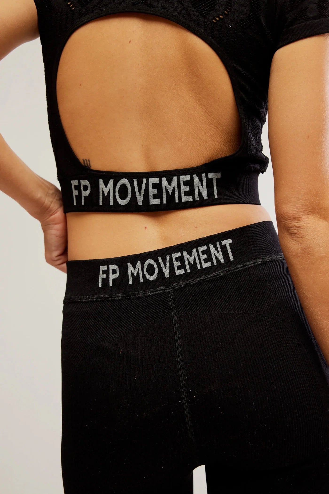 NWT FP Movement by Free People Run The Distance Baby Tee in Black | Size M/L